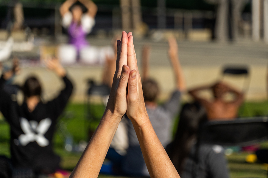 Yoga Day - hands clasped during yoga session