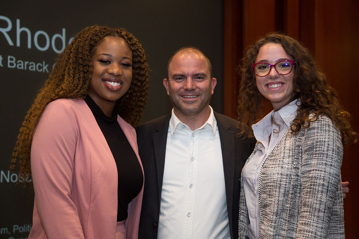 Three guest speakers together at an event